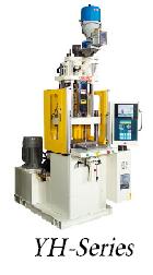 Vertical plastic injection molding machine