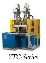 Two color vertical injection moulding machine